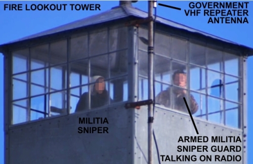 C4CF_Militia_Armed_Sniper_Guards_Fire_Tower_Talking_on_Radio