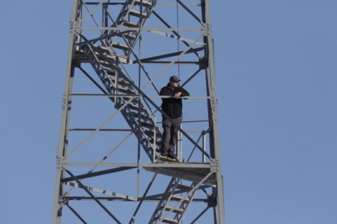 Militant 2016 Oregon standoff guard on fire watchtower with Baofeng