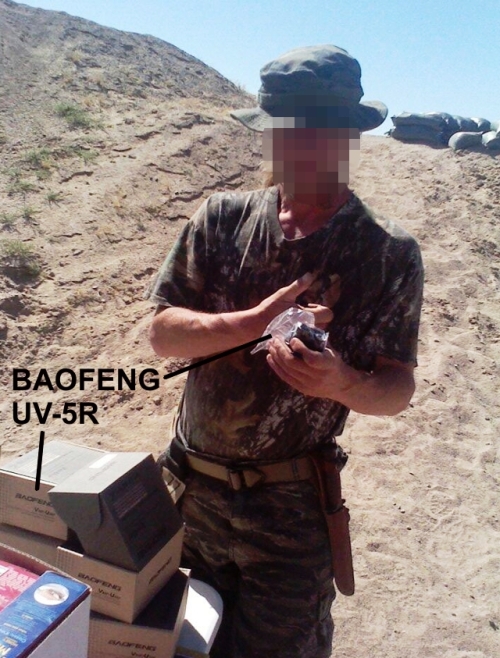 Militant at Nevada armed standoff 2014 unboxing a truckload of Baofeng UV-5R radios