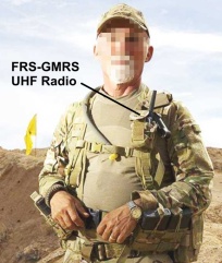 Militant at 2014 Nevada standoff poses in battle gear with an FRS GMRS UHF radio.